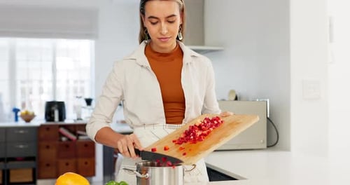 Woman, cooking and kitchen, vegetable and nutrition, board and knife, healthy food and diet at home