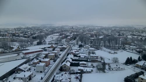 Aerial snow covered winter storm cityscape of lubawa city in Poland east europe