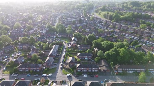 4K aerial shot of typical British houses from above in the morning and housing crisis