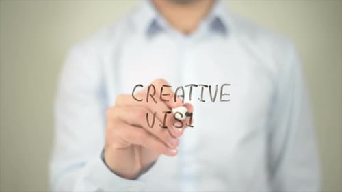 Creative Vision Man Writing on Transparent Screen