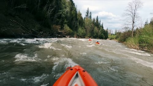 Kayaking on a Wild River in the Mountains POV