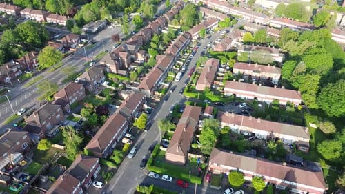 4K aerial shot of typical British houses from above in the morning and housing crisis
