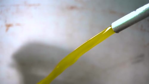 Machinery Fresh olive oil at the olive oil factory 4K