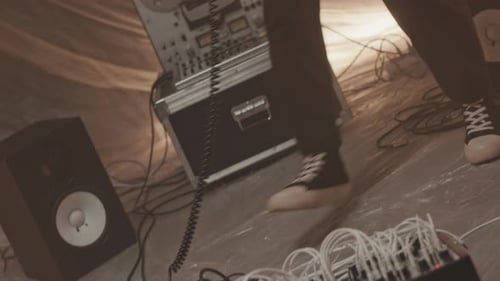 Male Guitarist Playing Electric Guitar Indoors