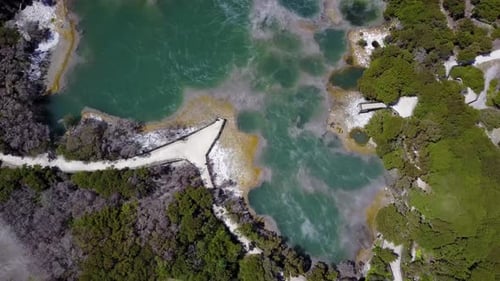 Aerial shot of hot spring, natural steamy thermal basin - New Zealand, Rotorua, Kuirau Park. camera