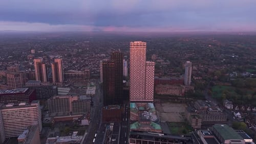 Croydon cityscape aerial view over illuminated sunset orange contemporary skyscraper towers