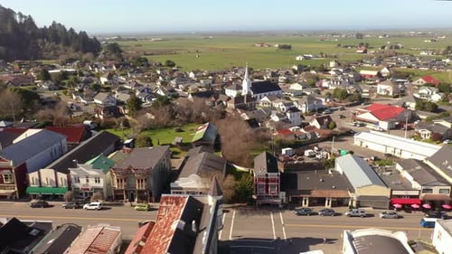 Ferndale California historic downtown with old Victorian homes, drone view.
