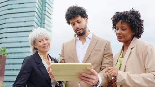 Business Multiethnic People Financial Business People Using Tablet Outside Office Building