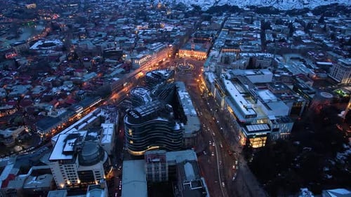 Evening Traffic In The Snowy City