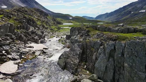 Aerial A Mountain Stream Originating on the Slopes of Mount Telposiz