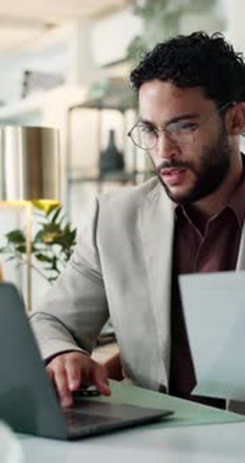 Laptop, accountant and businessman with paperwork for budget comparison, issue or fraud