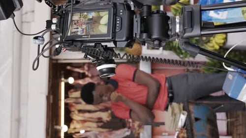 The Backstage Activities of an Actor Preparing for a Commercial Video Shoot - Vertical Shot