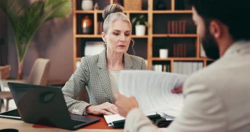 Documents, legal consultant and business people in meeting, discussion and advice in office