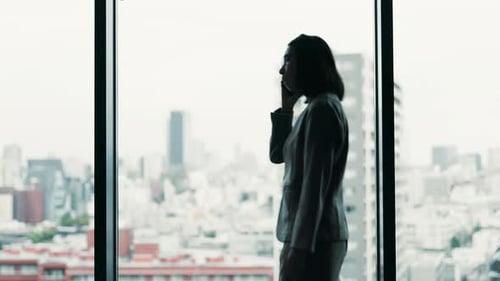 Phone call, business and Japanese woman in office for negotiation, bad news and communication