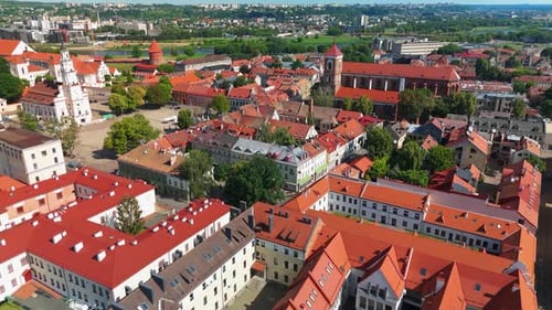drone shot of Kaunas Cathedral Basilica and red roofs in Kaunas old town near the Nemunas river, in