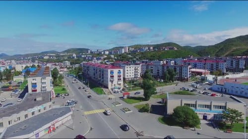 Modern City with Multilevel Buildings and Wide Avenue