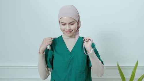 Portrait of Female muslim doctor with stethoscope at office.