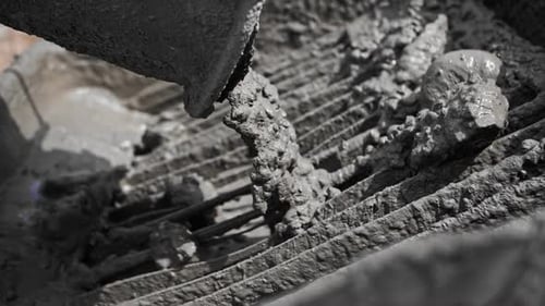 Concrete Pours From a Mixer