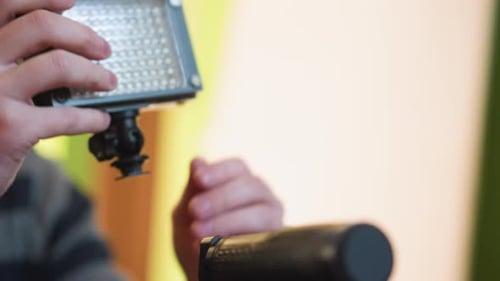 Studio Guy Adjusting Microphone Stand Preparing It for Setup