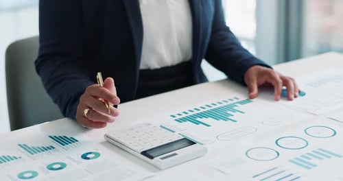 Business hands, calculator and financial statistics, graphs or charts for revenue