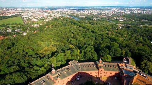 Kosciuszko Mound - aerial establishing footage with tourists Ukrainian flag on top