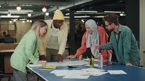 Multiethnic Creative Team of Designers are Working on a Project in the Office