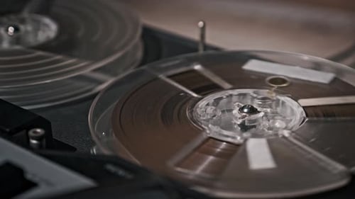 Vintage ReeltoReel Tape Recorder in Operation CloseUp