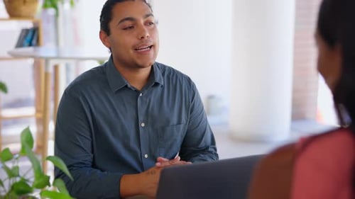 Creative businessman, laptop and interview in meeting or recruitment process for company startup