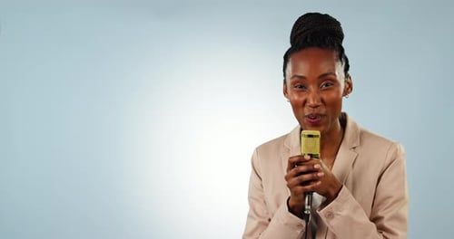 Microphone, presentation and a black woman reporter on a blue background in studio for a broadcast