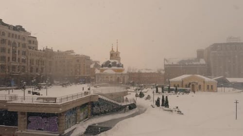 Historical City Center While Heavy Winter Snowfall