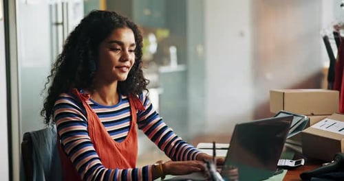 Happy woman, fashion and typing on laptop for small business, website idea or planning logistics