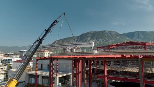 Aerial View Quality HighRise Work Erecting Steel Structures for Rooftop Installation in Commercial