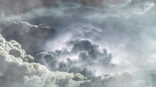 point of view of the sun in a thick cloud in the blue sky