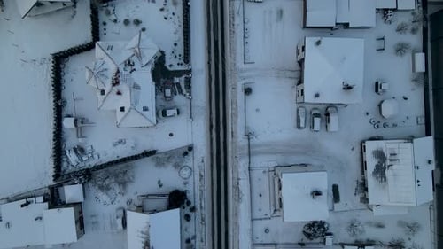 Rooftop Lubawa terrace villas layered with frost snow christmas aerial