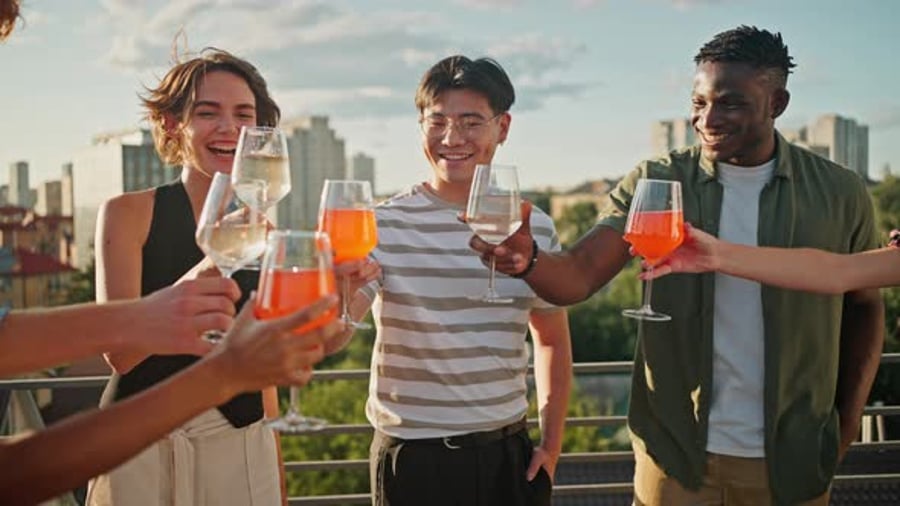 Cover for Carefree Young People Having Party on Terrace with Drinks