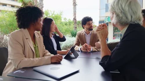 Business Multiethnic People Financial Business People Having a Serious Conversation