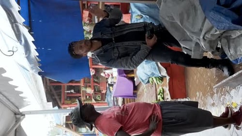 Film Crew Preparing for a Shoot - Vertical Shot