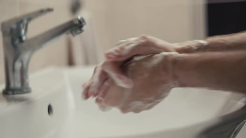 A Person Washes His Hands with Soap and Water Hygiene and Health Care Fight Against Viruses and Dirt