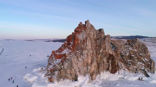 Aerial Shot of a Shamanka Rock on Olkhon Island at Sunset Winter Landscape Popular Touristic
