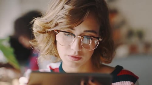 Face, business woman and tablet for online reading, social media or marketing strategy