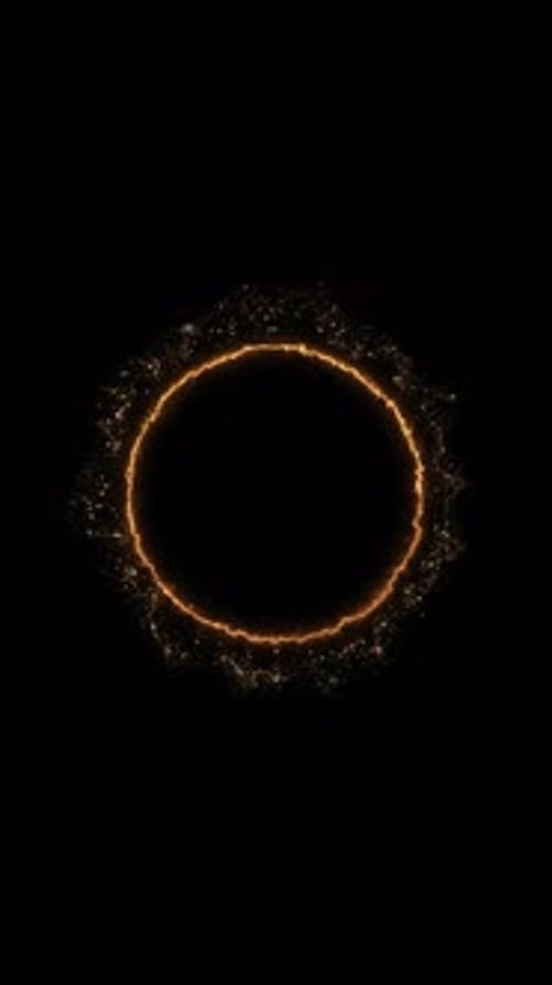 Glitter circle with sparkling light Glowing golden ring sparkling light particles floating in dark m