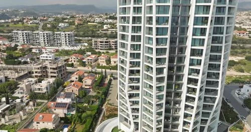 Aerial View Highrise Glass Building in the Cityscape