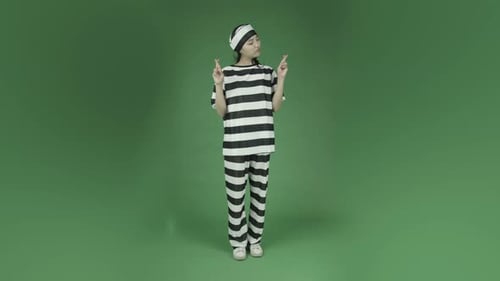 young asian adult woman prisoner isolated on green-screen background