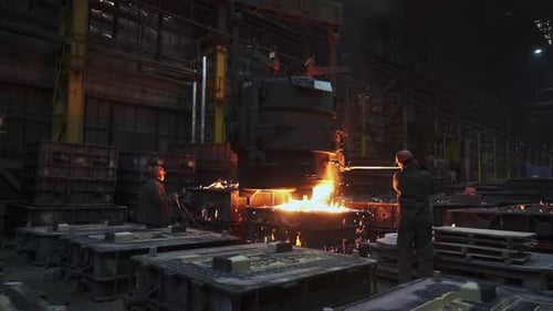 Molten Metal Pouring in an Industrial Foundry is a Fascinating Process to Observe Closely Stock Clip