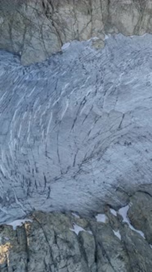 Stunning Aerial View of a Massive Glacier in British Columbia, Canada's Majestic Mountains