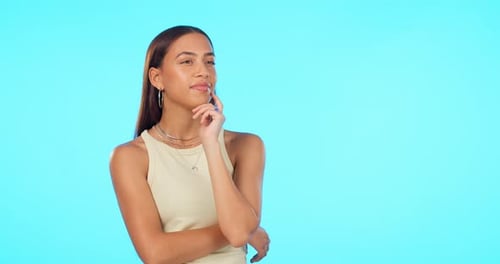 Thinking, ideas and woman with agreement, yes and thoughts on a blue studio background