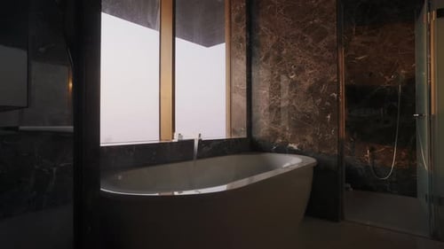 Luxurious Bathroom With White Bathtub And Elegant Marble Wall Pattern Design. - ascend shot