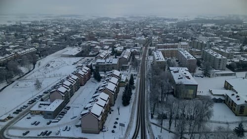 Aerial View Of Snow-covered Houses And Streets At Lubawa Town During Winter In Poland.
