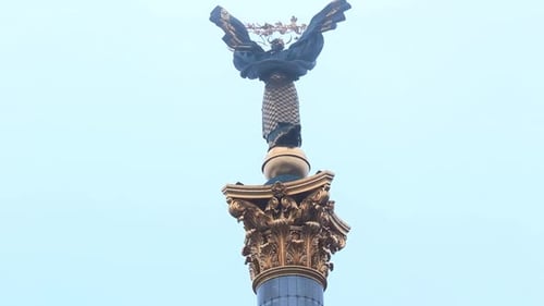 Independence Monument Towering Over Kyiv Cityscape Iconic Angel Figure Symbol of Freedom Filmed in