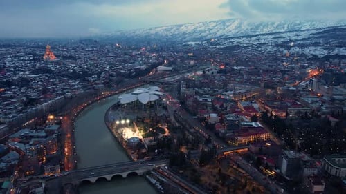 Evening Traffic In The Snowy City